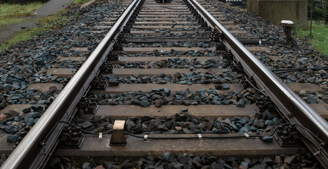 Railroad track vanishing in the distance