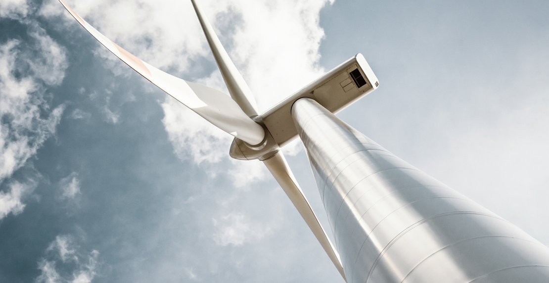 Wind turbine with blue gray sky